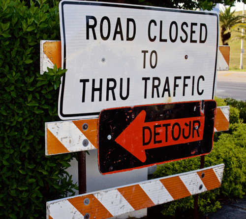 road closed detour sign